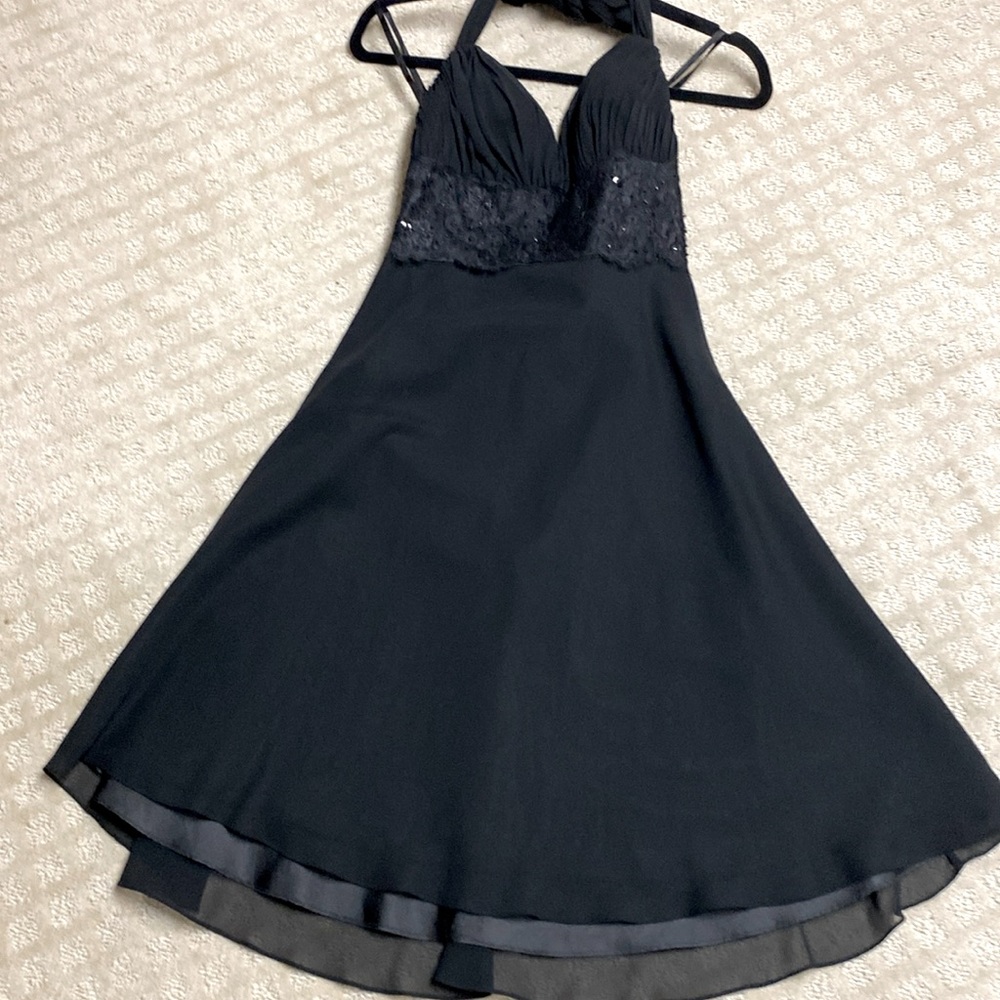 Gorgeous halter style evening dress . White house black market size 0.